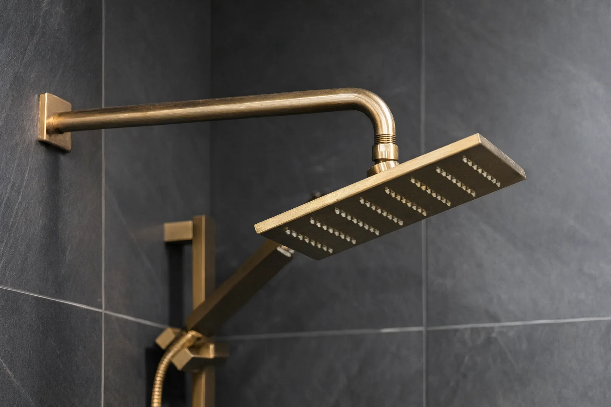 Whole-home remodel — brass rain shower head detail, Orange, Avorino