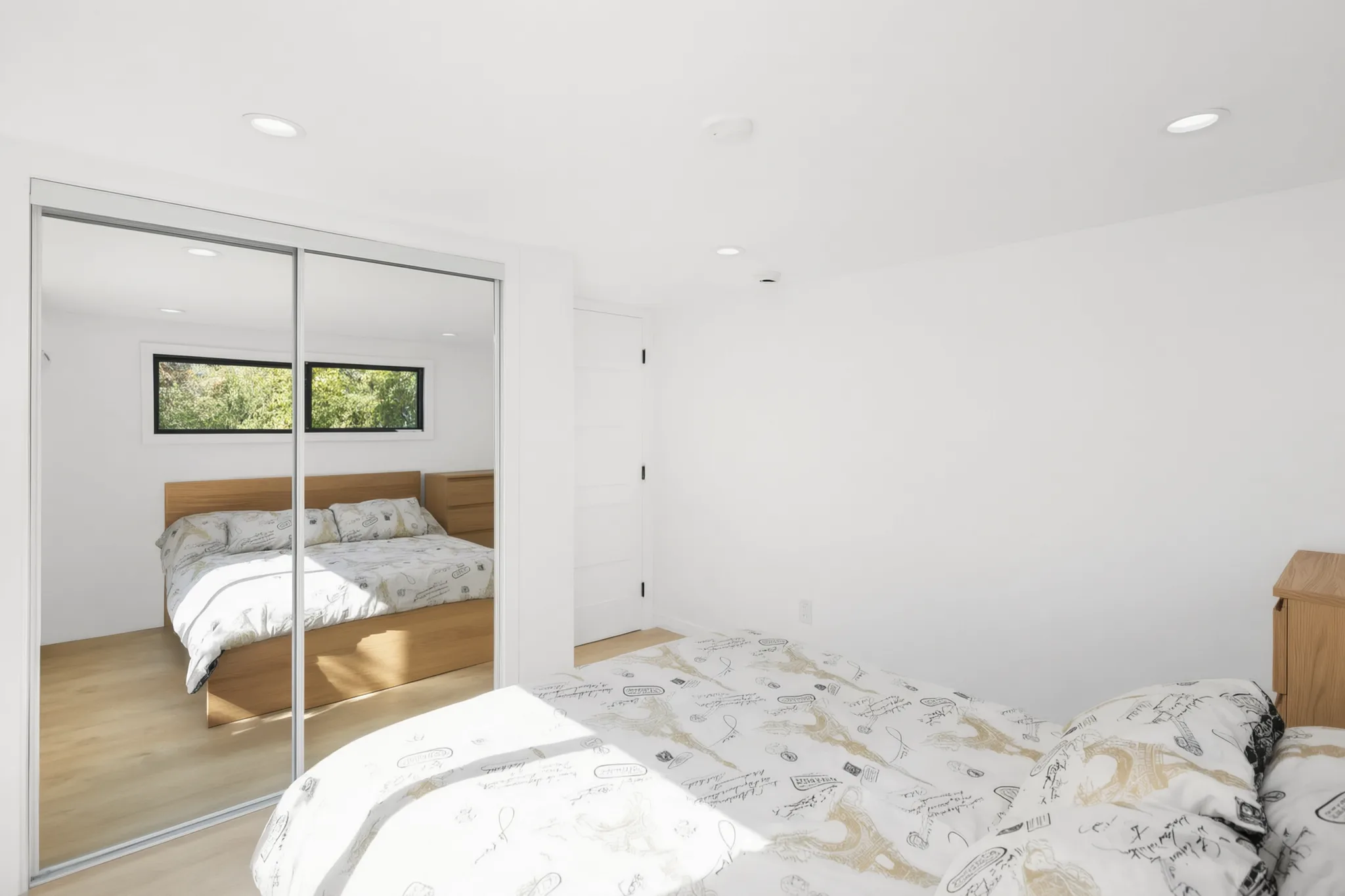Two-story detached ADU — bedroom with mirrored closet, Santa Ana Hills, Avorino