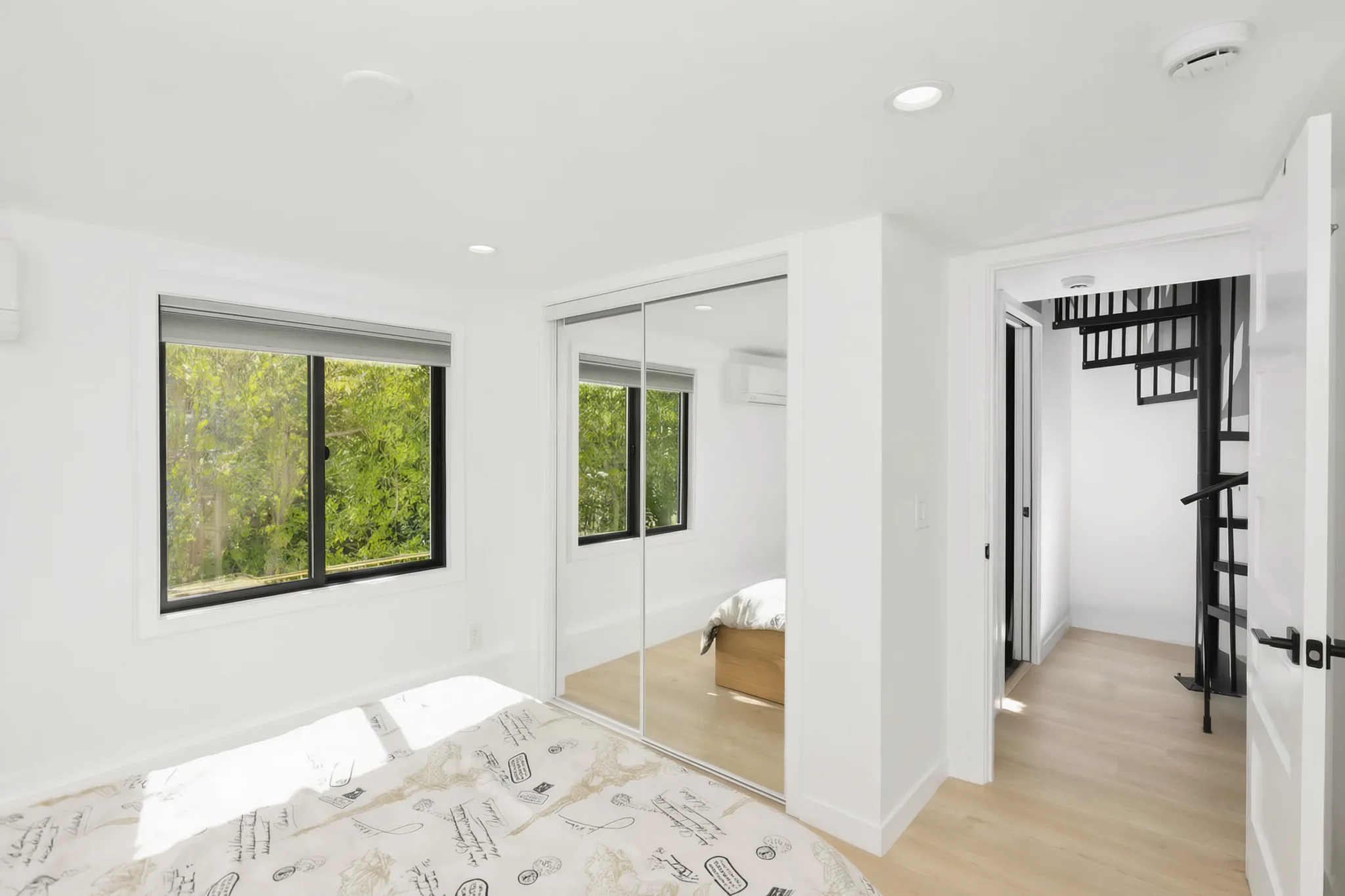 Two-story detached ADU — bedroom to the spiral stair, Santa Ana Hills, Avorino
