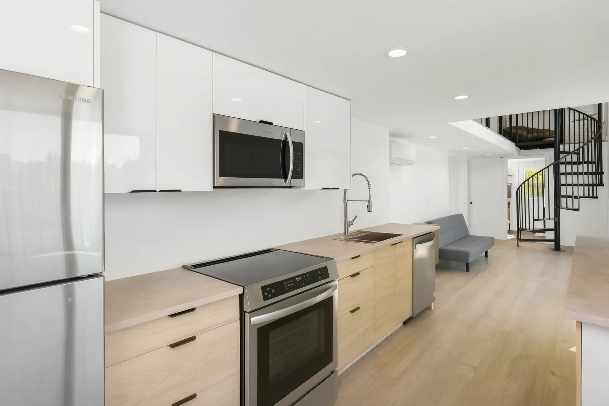 Two-story detached ADU — kitchen with white uppers and light-oak lowers, Santa Ana Hills, Avorino
