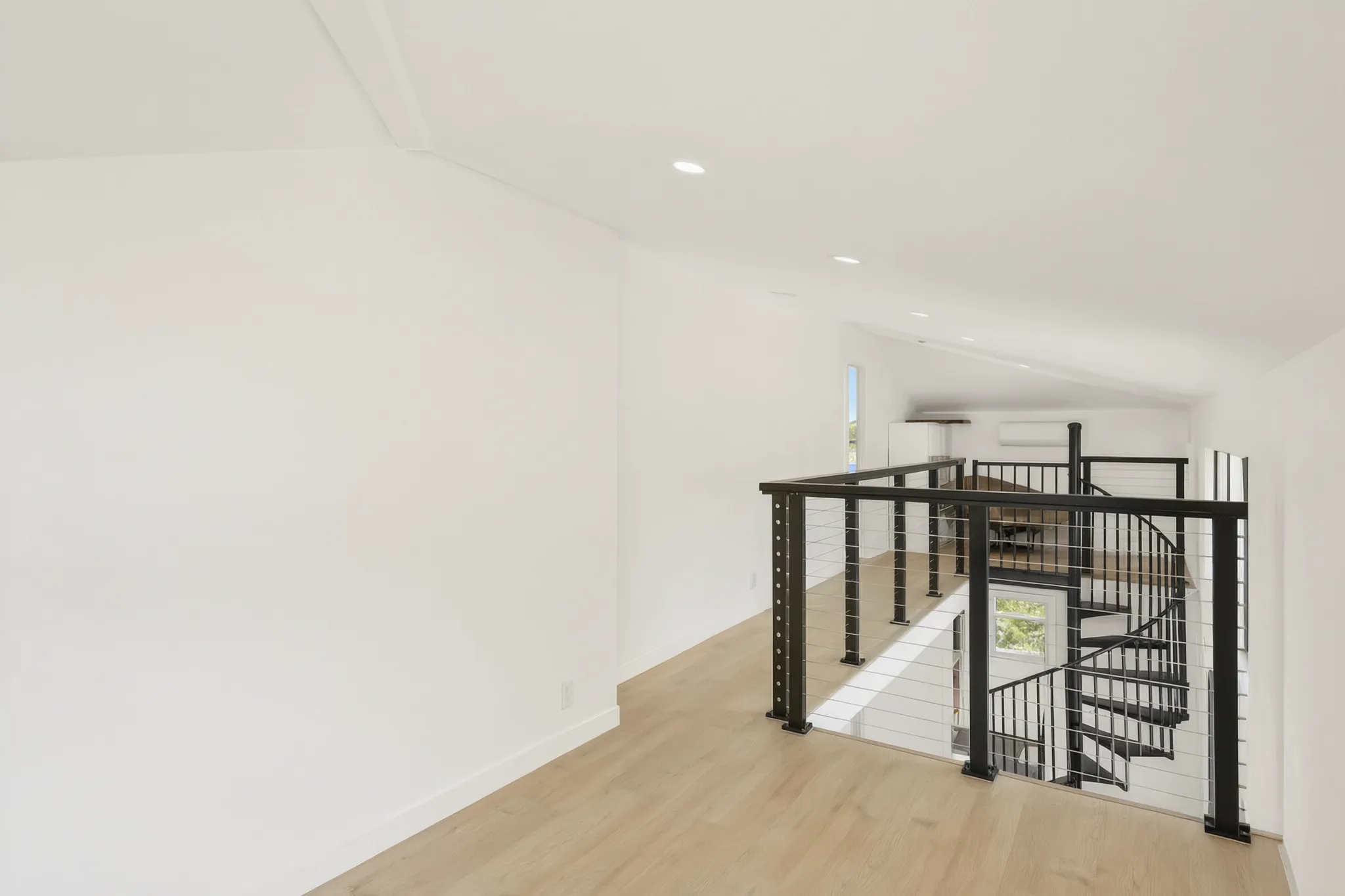 Two-story detached ADU — loft and stair opening, Santa Ana Hills, Avorino