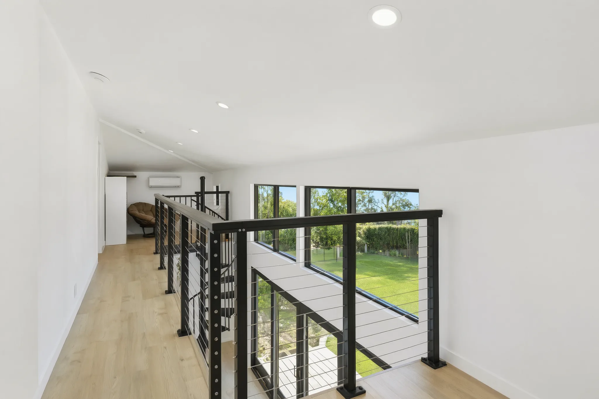 Two-story detached ADU — loft looking down to the sliders, Santa Ana Hills, Avorino