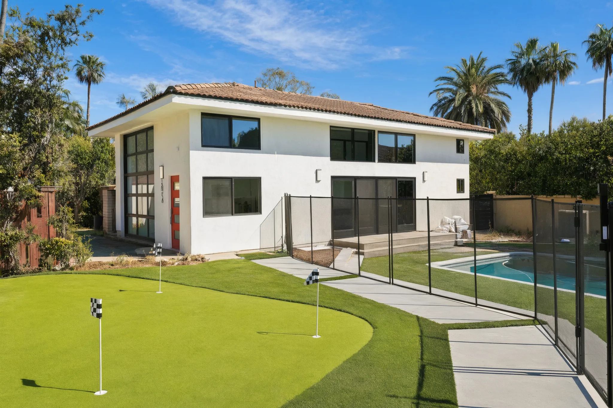 Two-story detached ADU, Santa Ana Hills — rear elevation, putting green and pool, Avorino