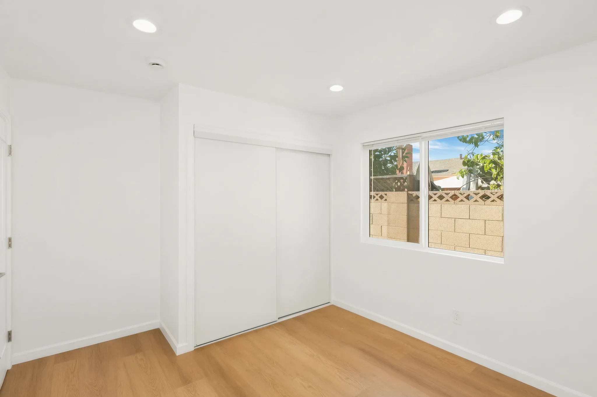 Detached ADU — bedroom with closet and window, Buena Park, Avorino