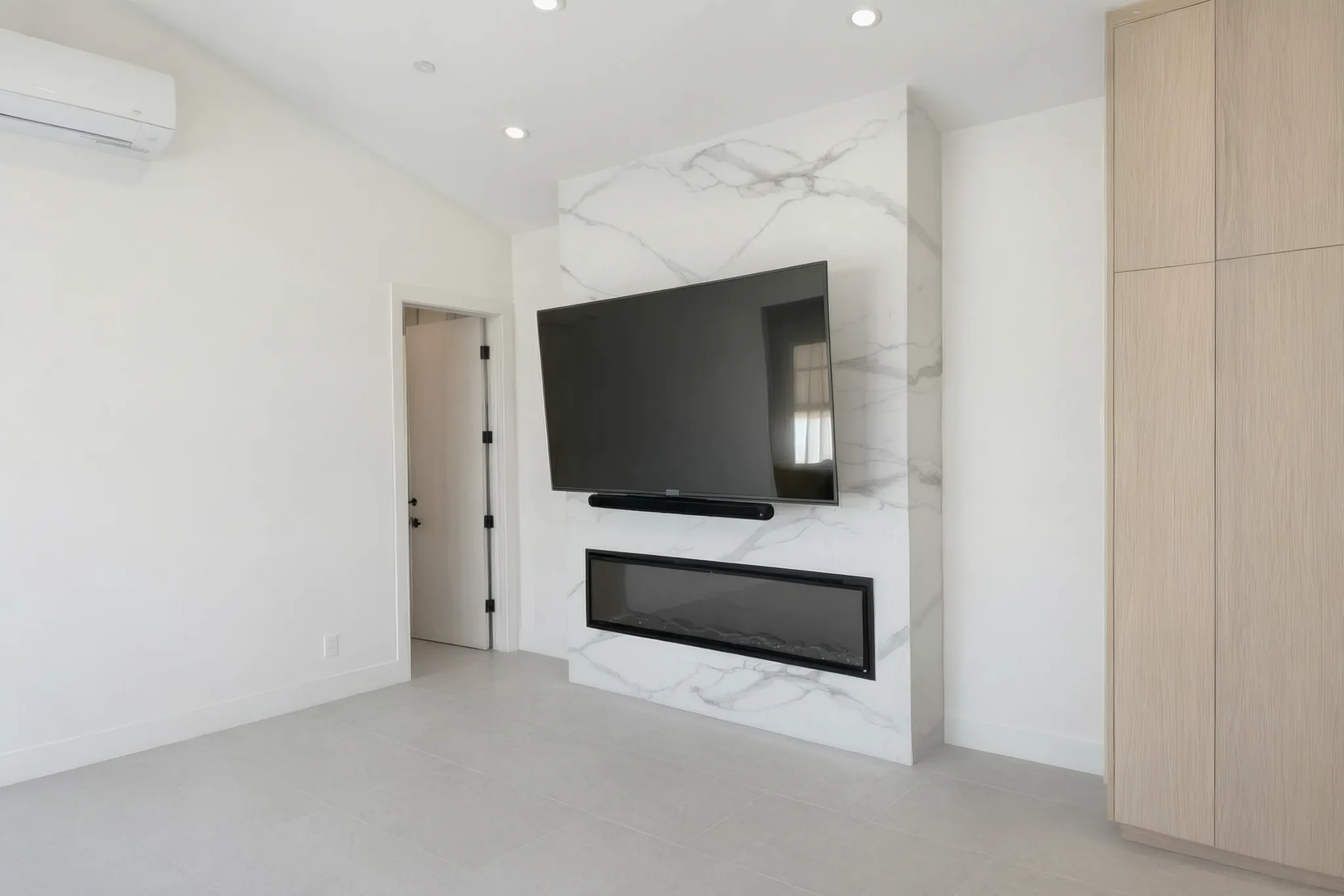 Custom pool house — living room with the media wall and linear fireplace, San Juan Capistrano, Avorino