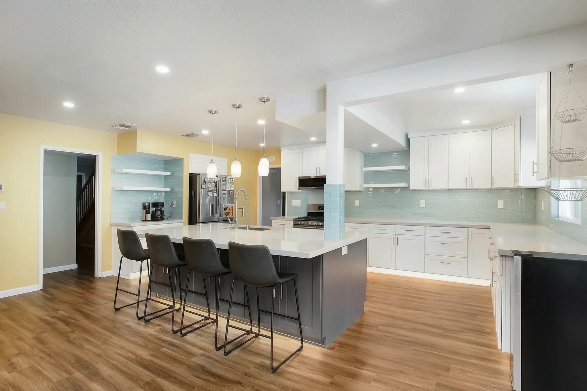 Open-concept kitchen remodel — island with seating, Orange, Avorino
