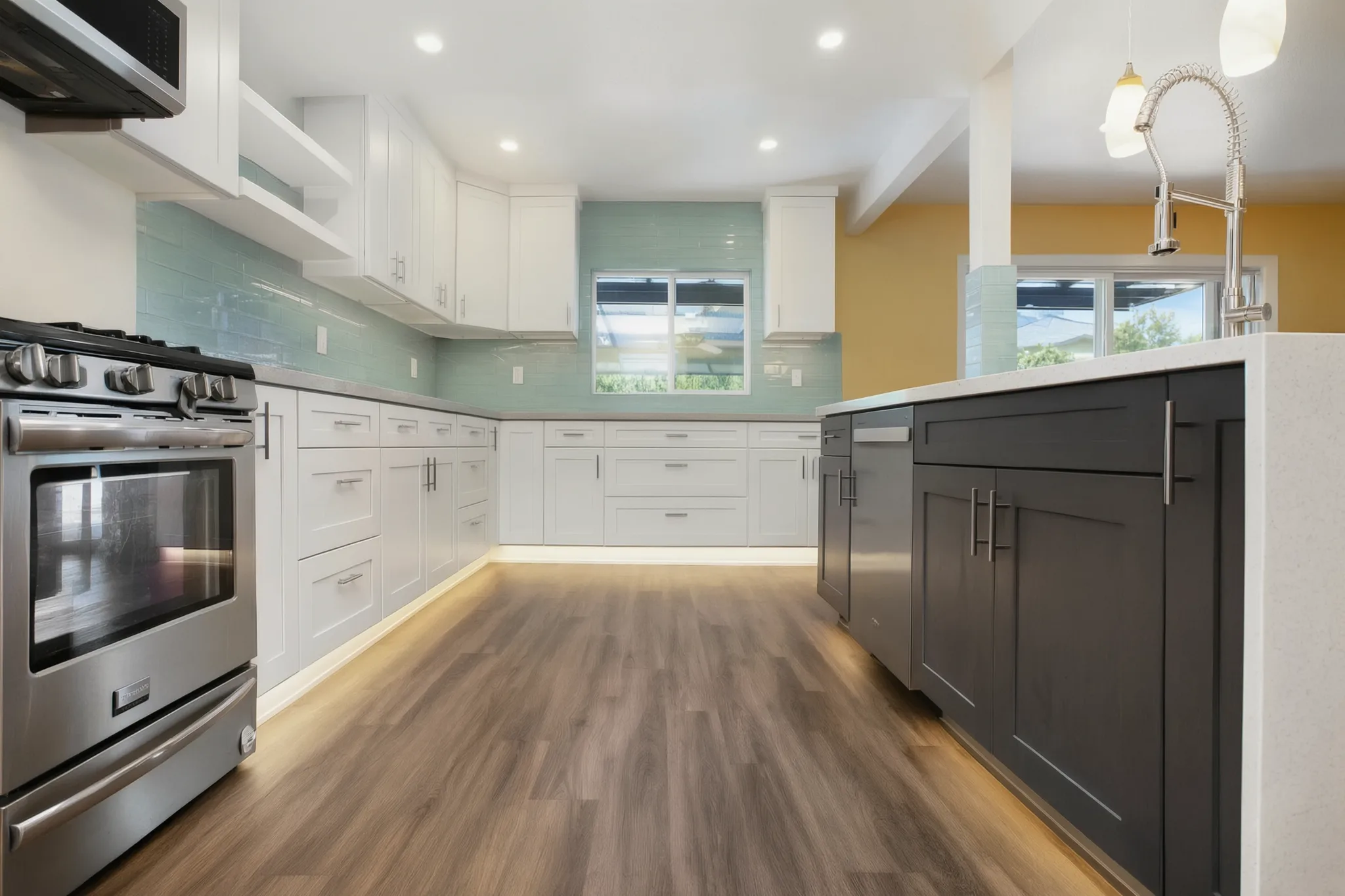 Open-concept kitchen remodel — dark island with waterfall edge, Orange, Avorino