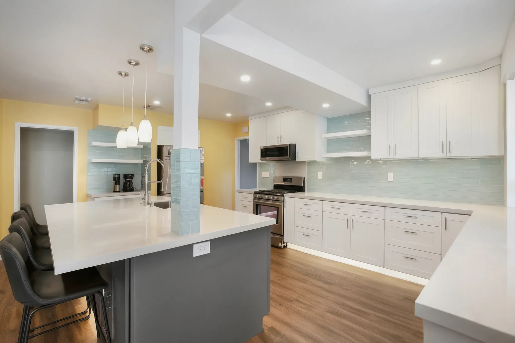 Open-concept kitchen remodel — island and open floor plan, Orange, Avorino