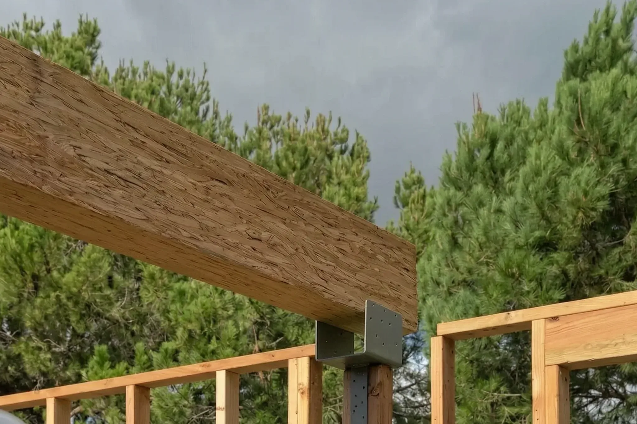 Pool house under construction — ridge beam set on the framed walls, San Juan Capistrano, Avorino