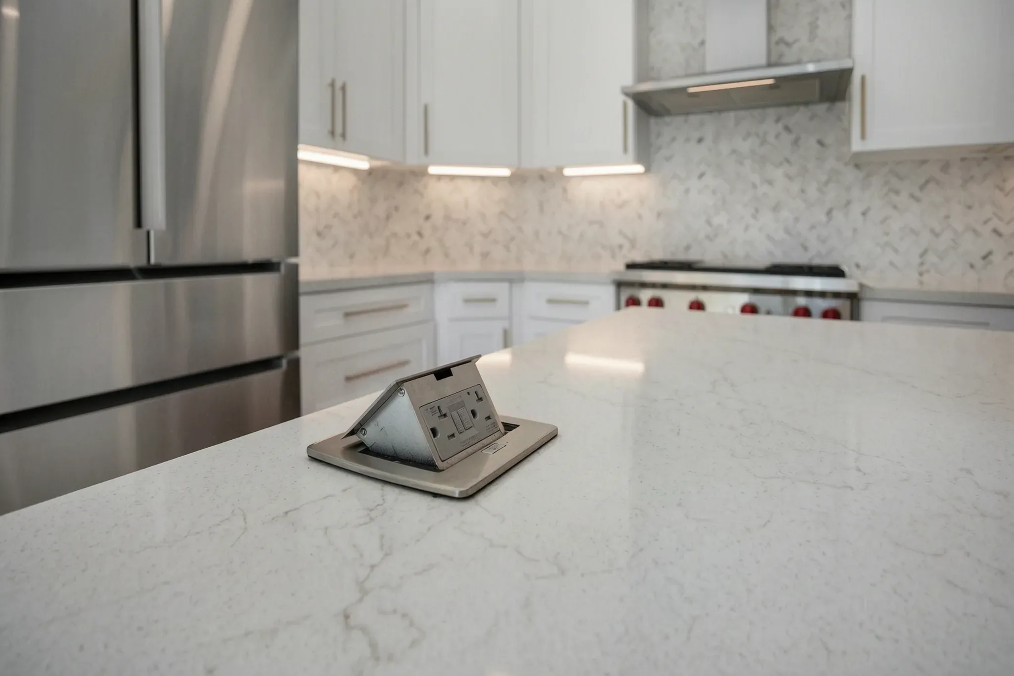Custom home — pop-up counter outlet on the island, Aliso Viejo, Avorino
