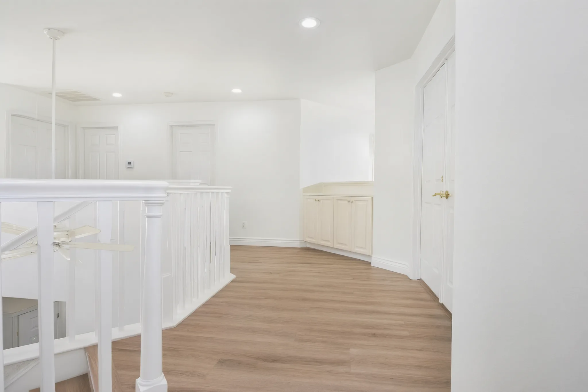 Hillside custom home — upper landing and hall, Laguna Niguel, Avorino