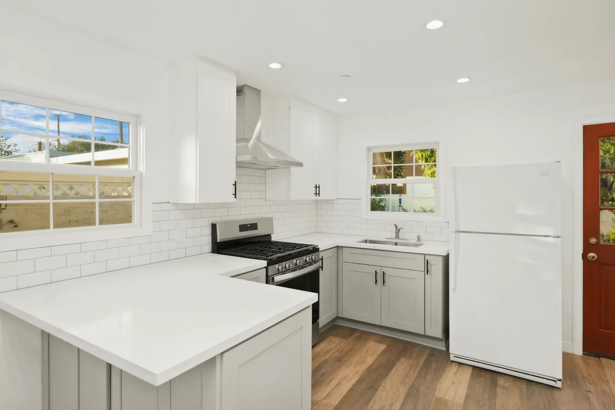 Attached ADU — kitchen with subway-tile backsplash and gray lowers, Orange, Avorino