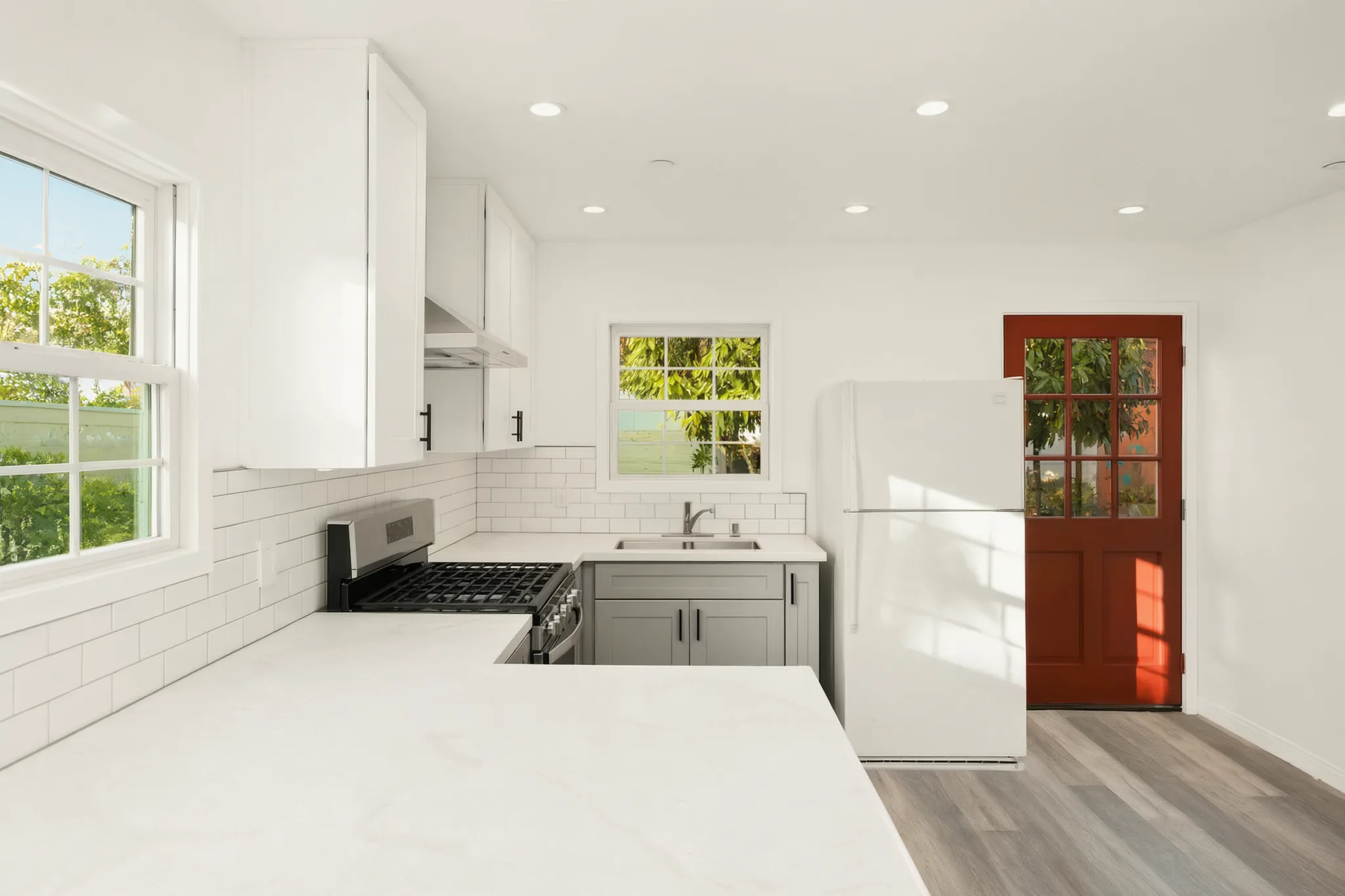 Attached ADU — kitchen and the red entry door, Orange, Avorino