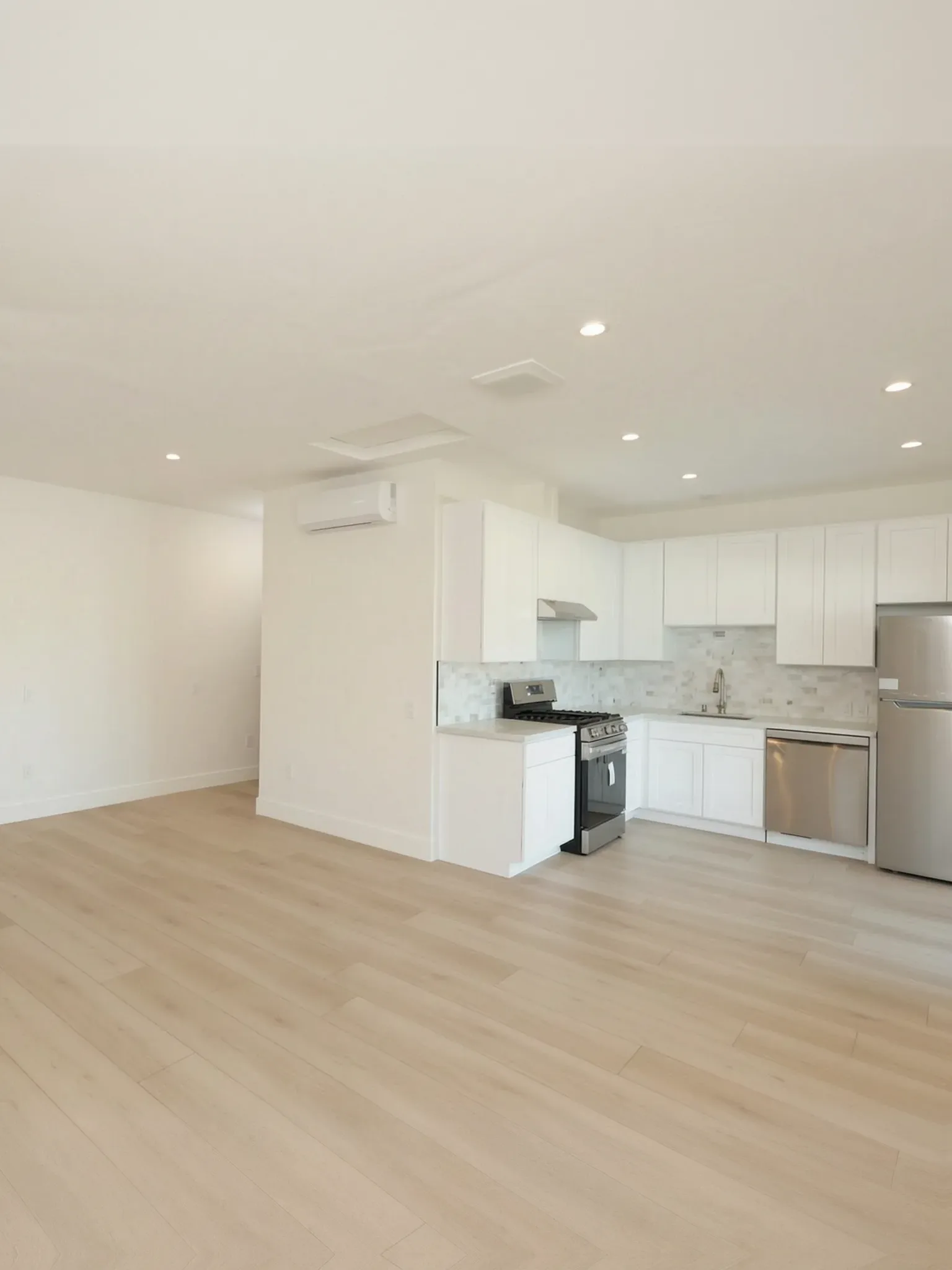 The open living room and kitchen of a garage-conversion ADU in Brea, built by Avorino.
