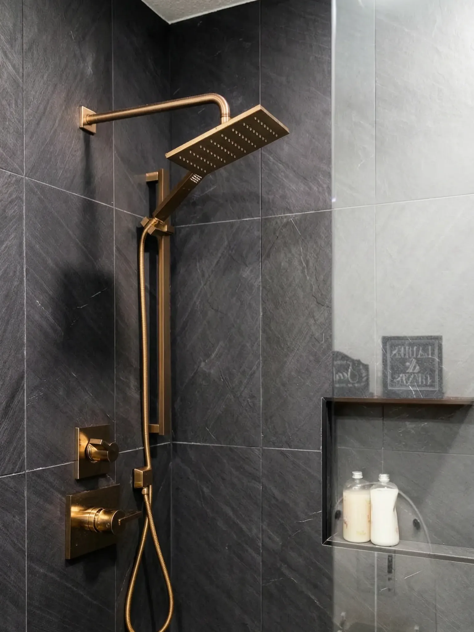 Whole-home remodel — shower with brass rain head, Orange, Avorino