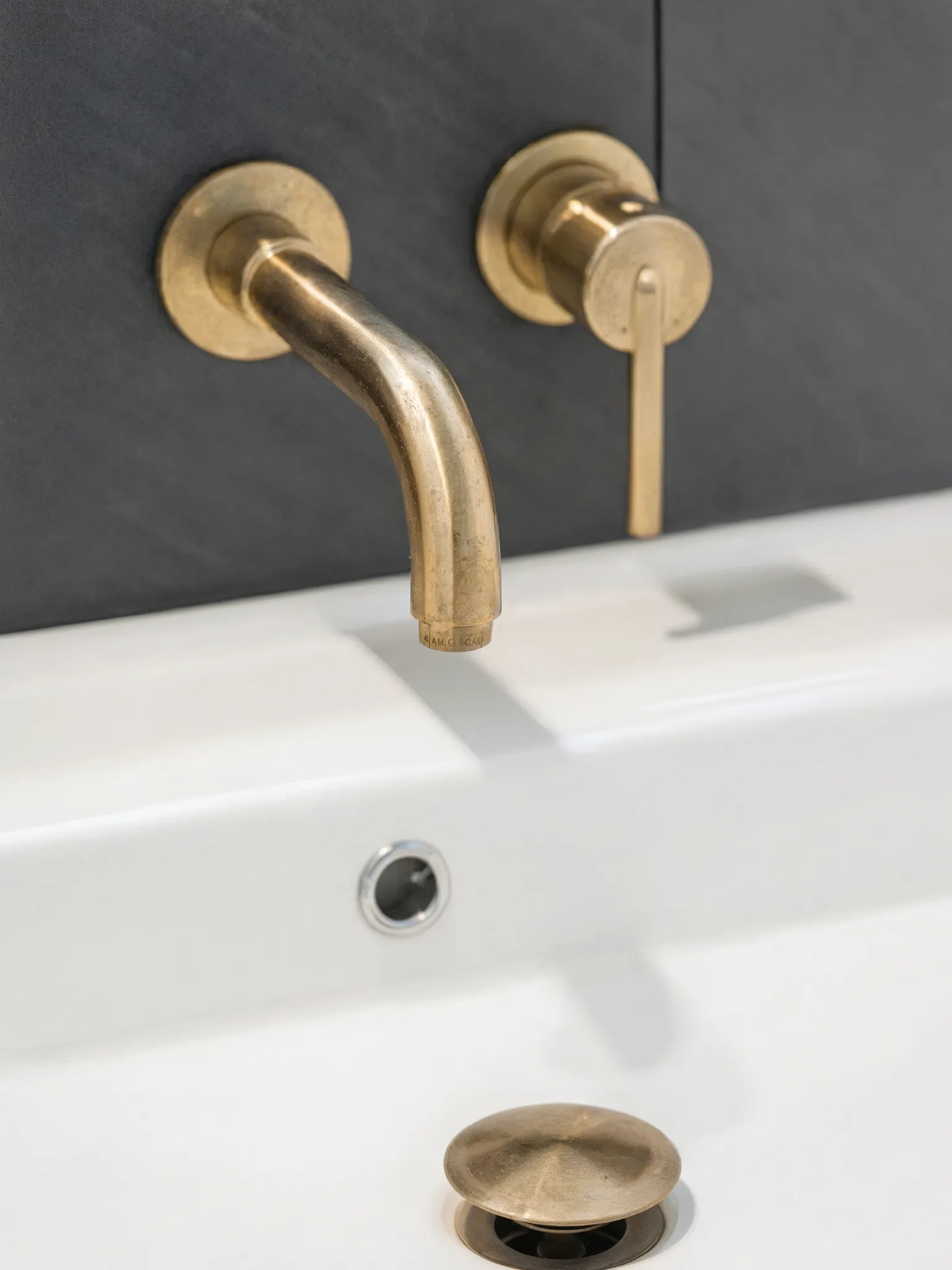 Whole-home remodel — bath, wall-mount brass faucet detail, Orange, Avorino