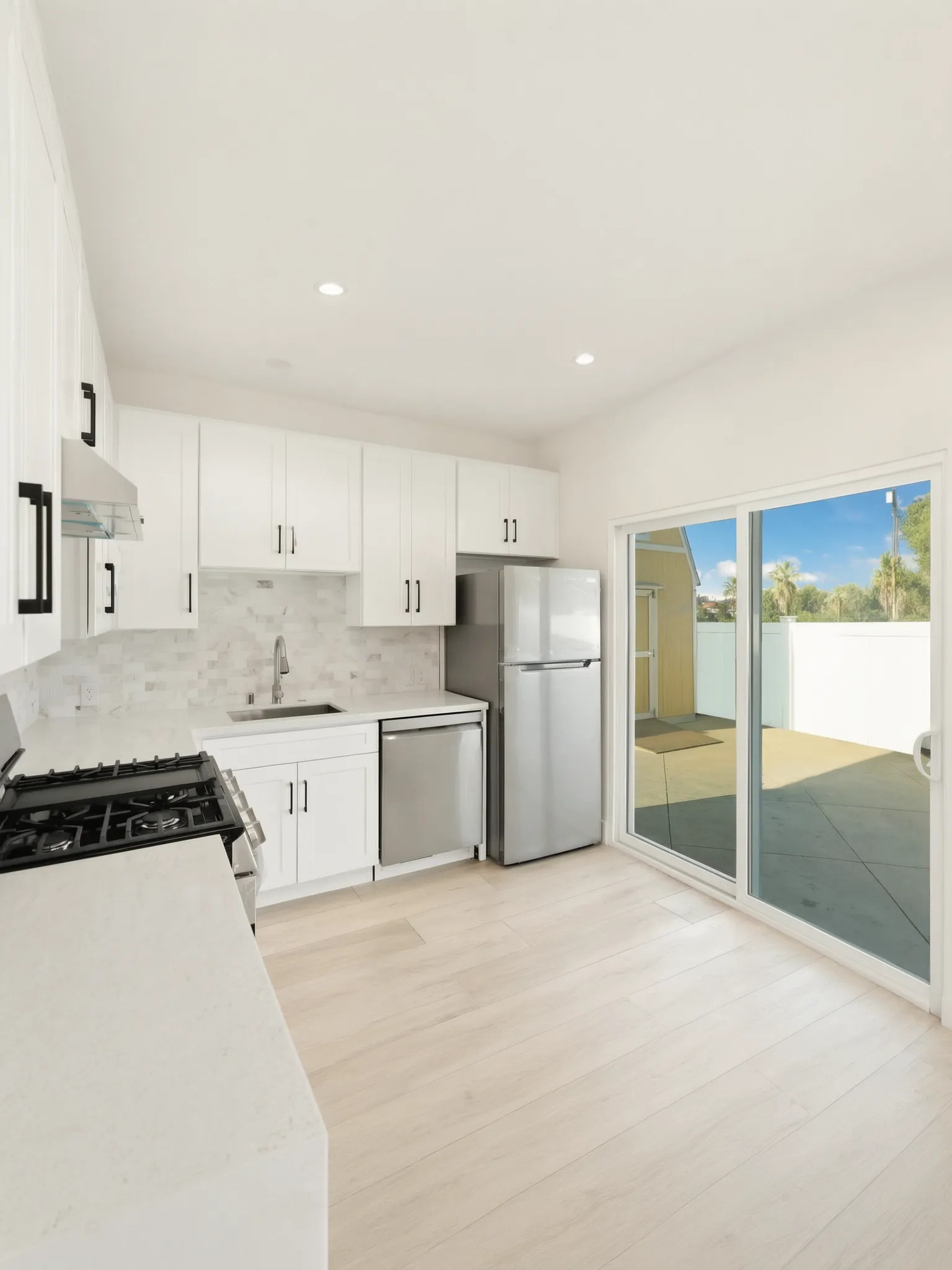 The finished kitchen of a garage-conversion ADU in Brea, built by Avorino