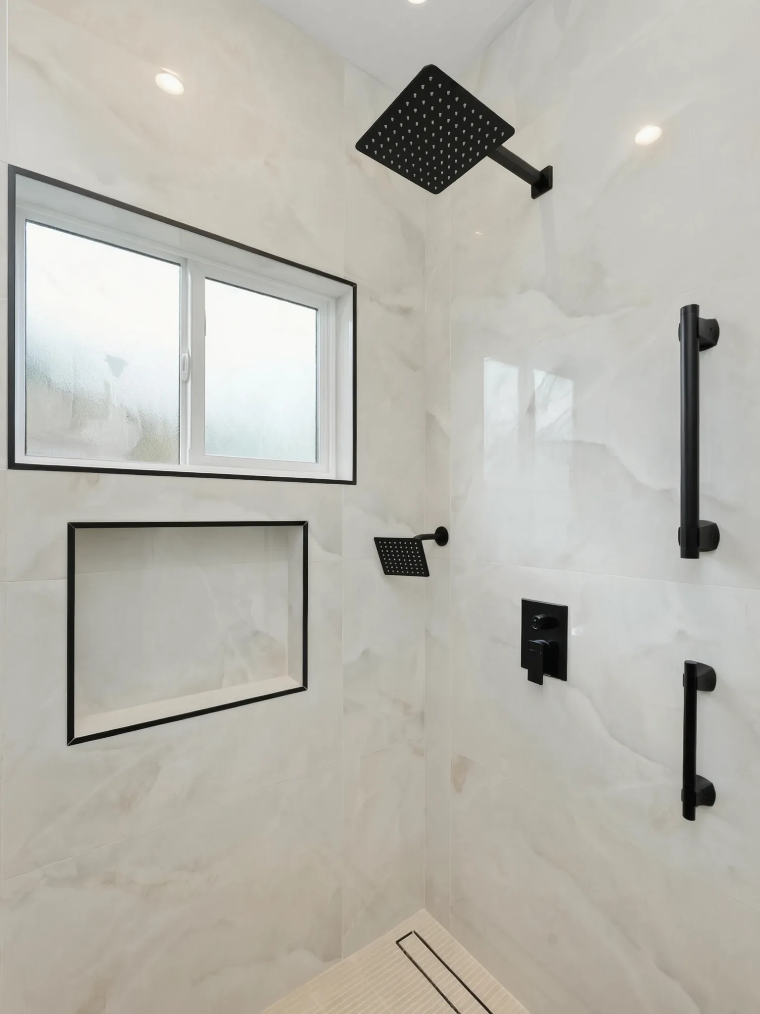 Garage conversion ADU — walk-in shower with matte-black fixtures, Brea, Avorino