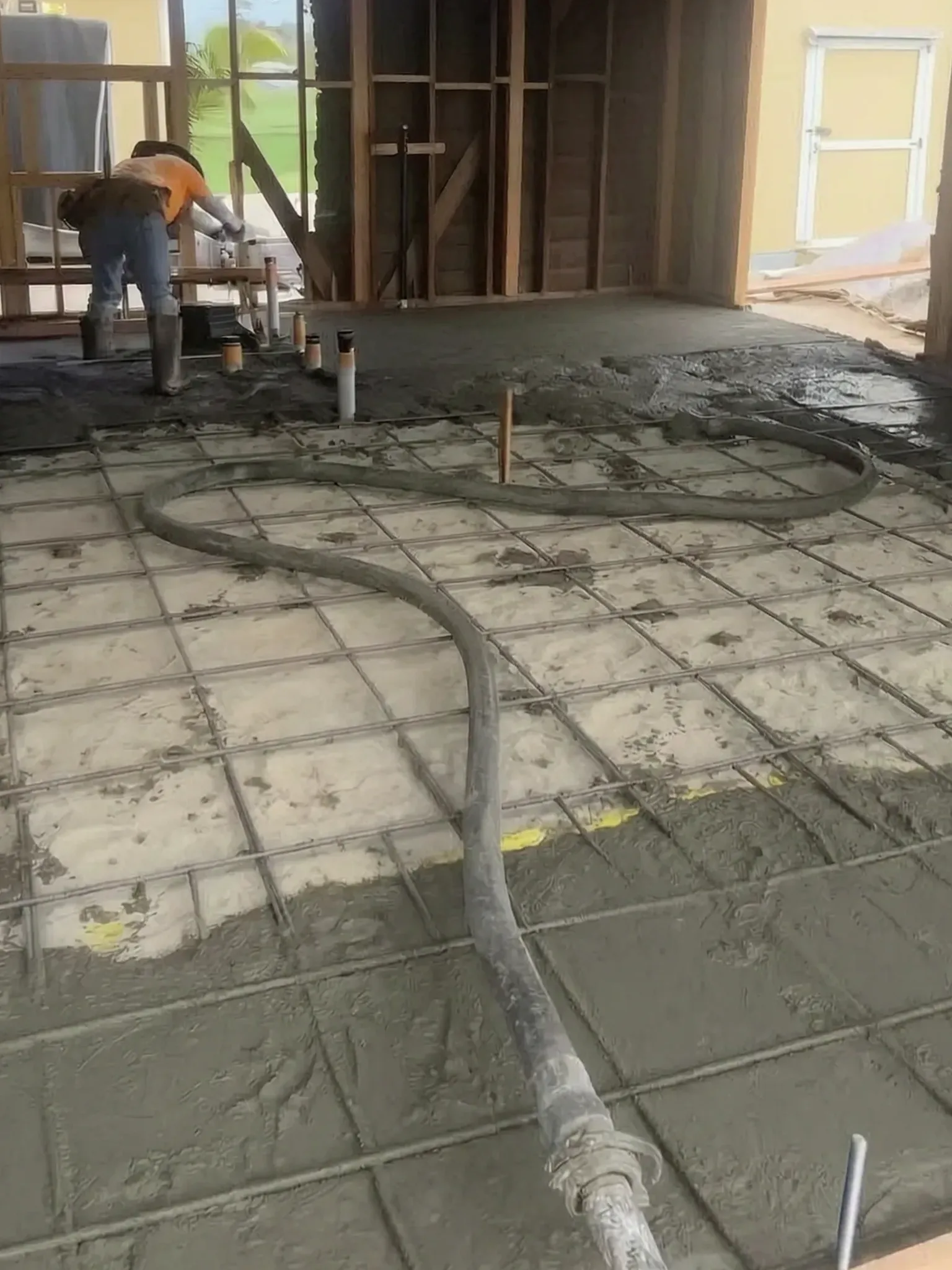 Garage conversion ADU under construction — the new slab being poured, Brea, Avorino