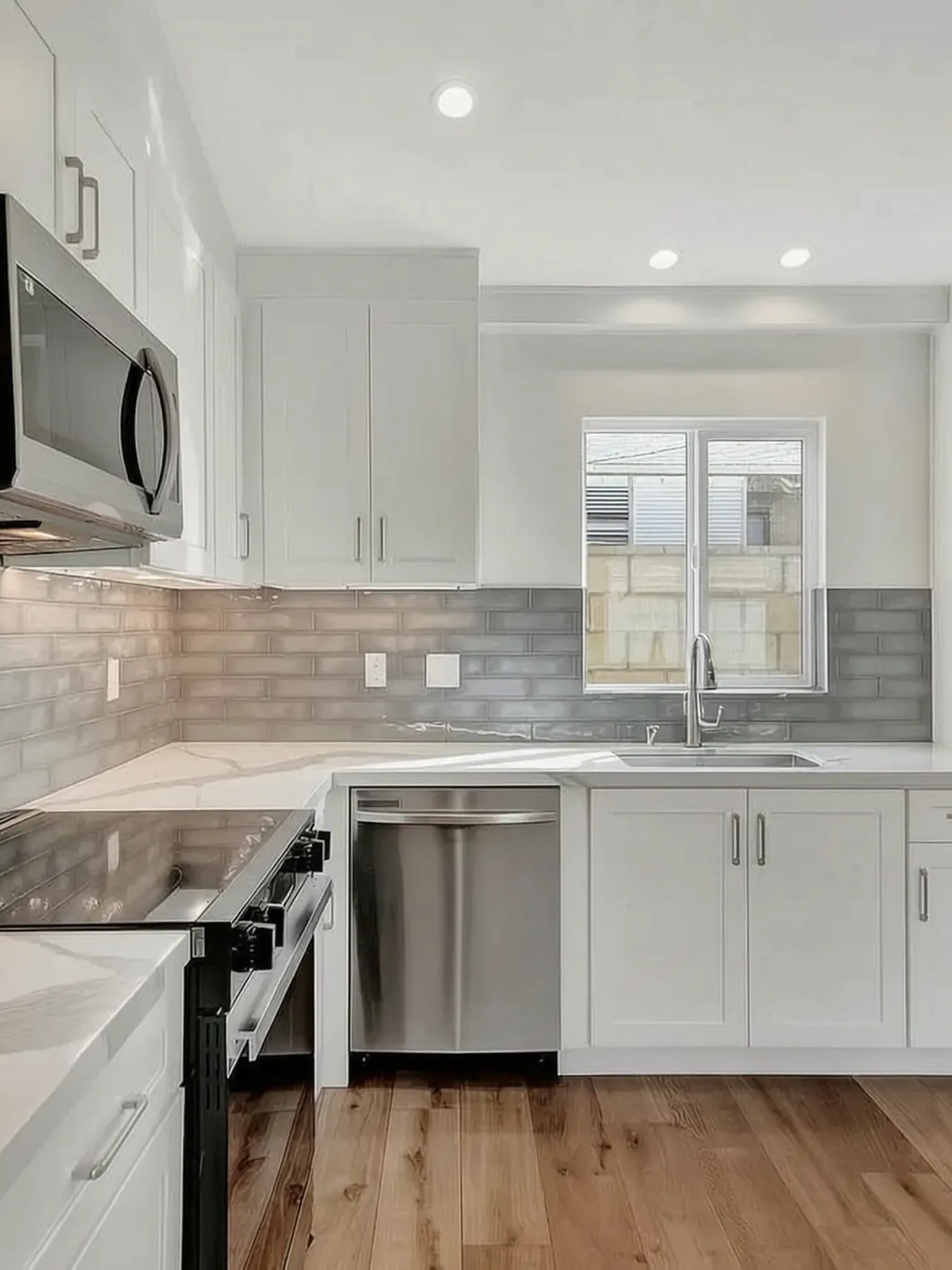 Detached ADU white-shaker kitchen with quartz counters, Avorino