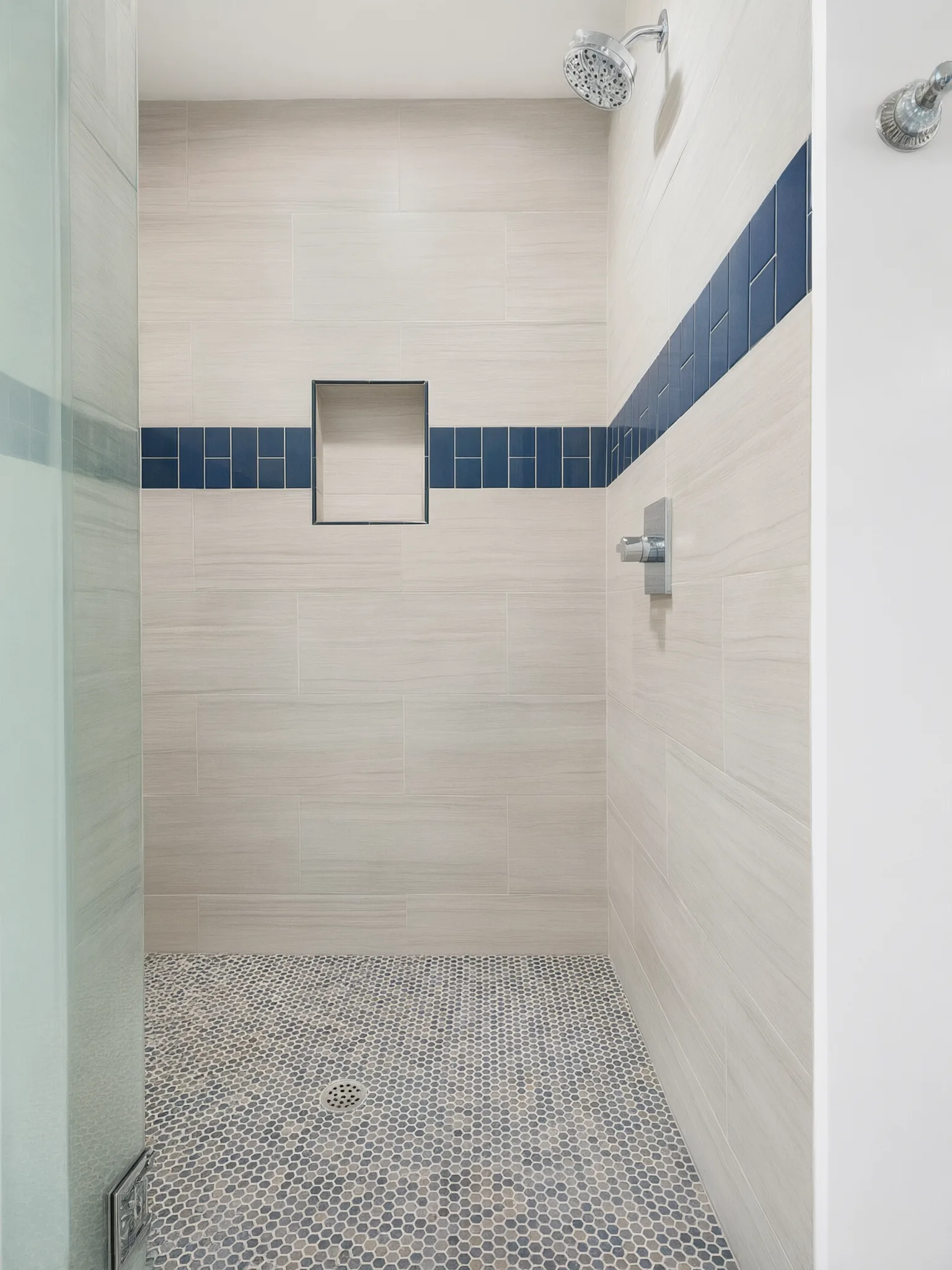 Primary bath remodel — walk-in shower with navy tile band, Mission Viejo, Avorino