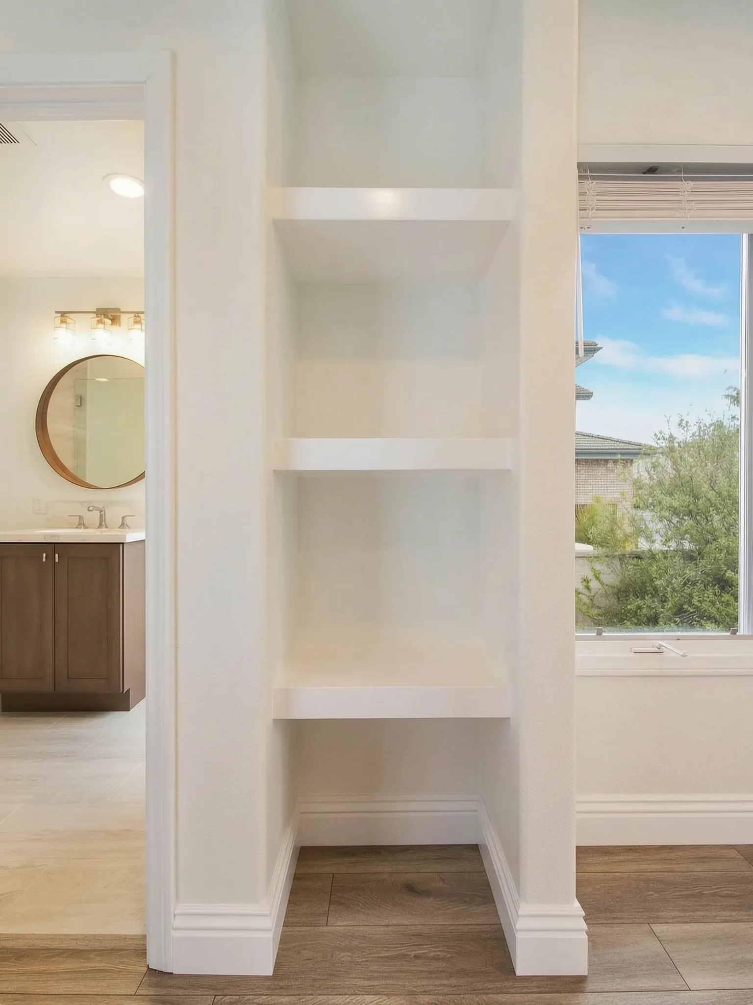 Whole-home remodel — built-in shelving and bath beyond, Laguna Niguel, Avorino