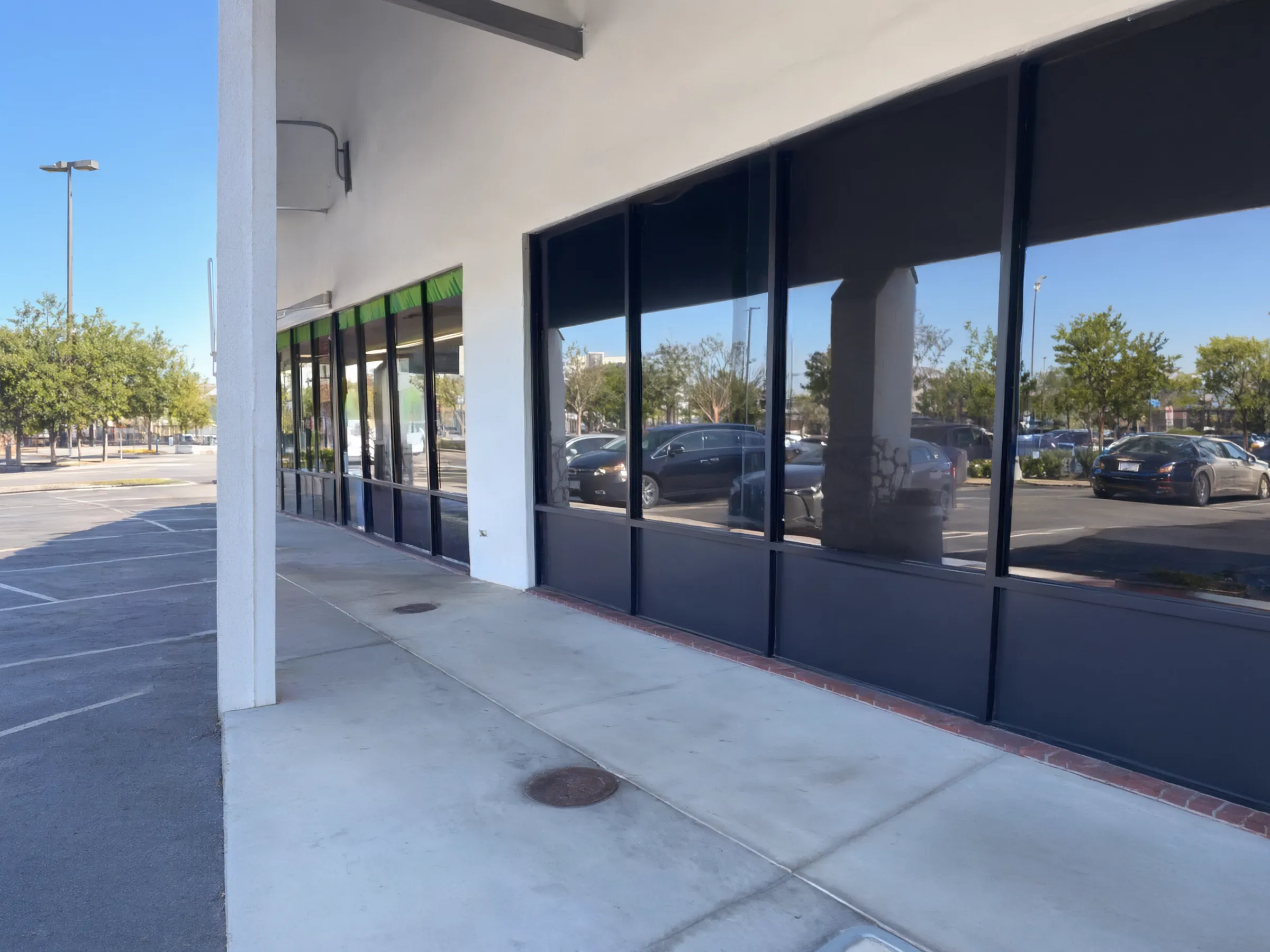 A vacant retail unit, before the tenant improvement. N10 Dance Studio, Tustin, built by Avorino.