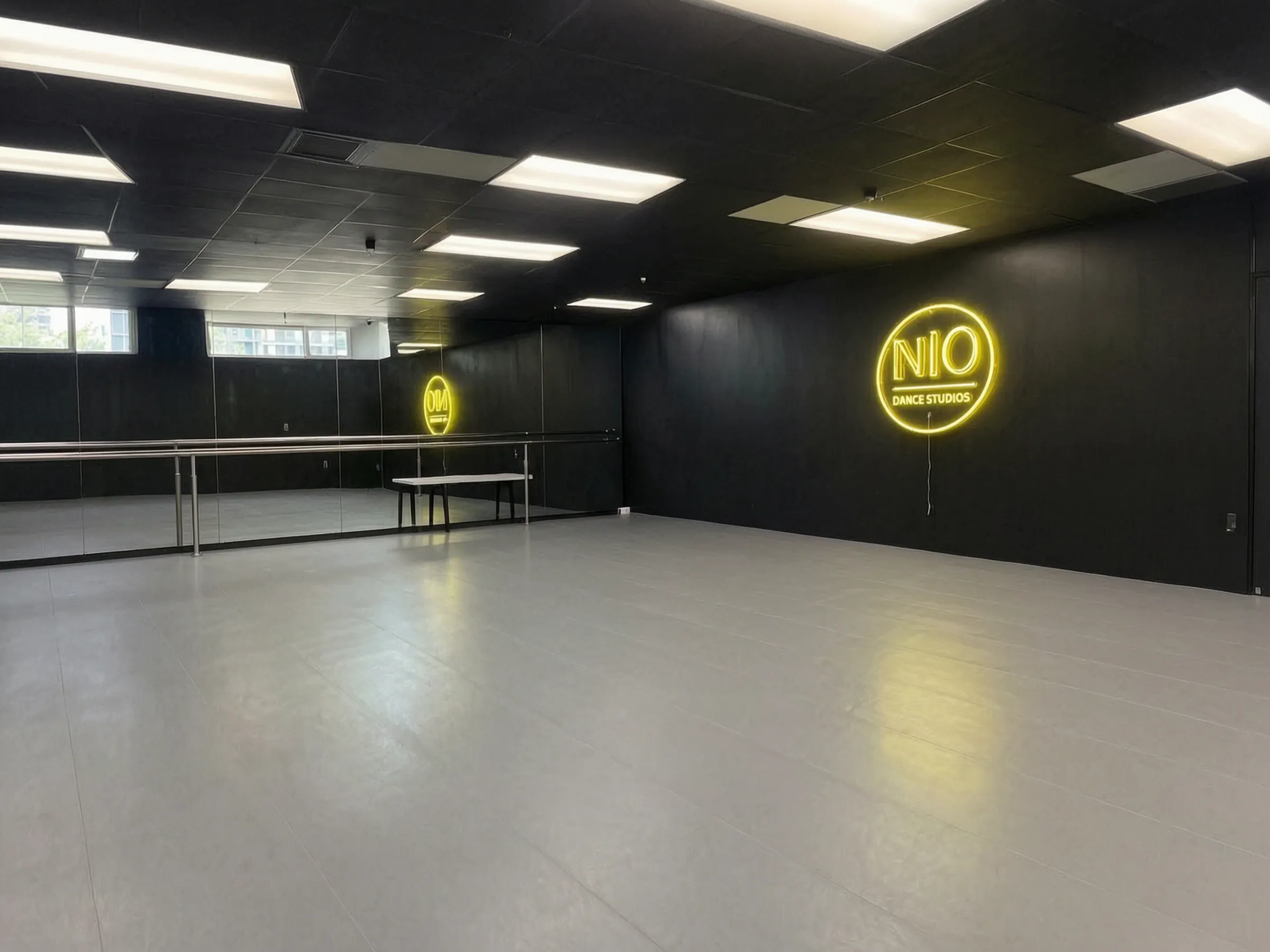 The finished N10 Dance Studio in Tustin, with its mirror wall and barre, built by Avorino.