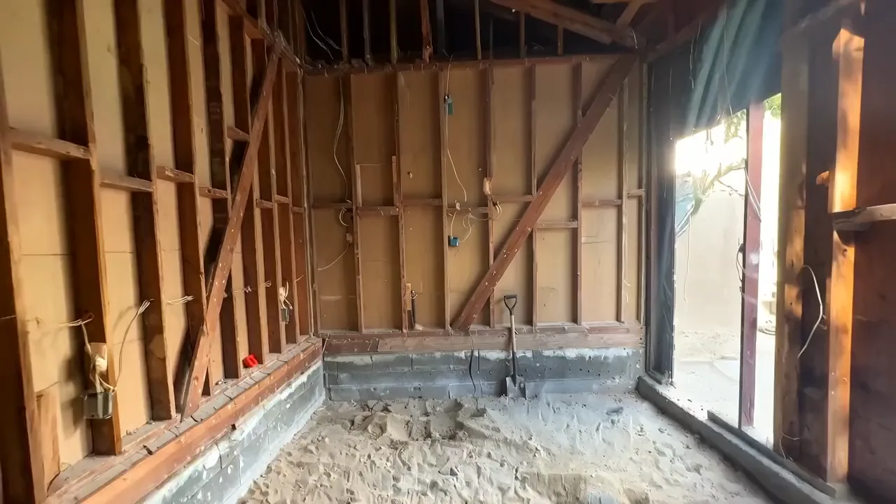 Time-lapse visualization of an Avorino garage-to-ADU conversion in La Habra, from bare studs to a finished room