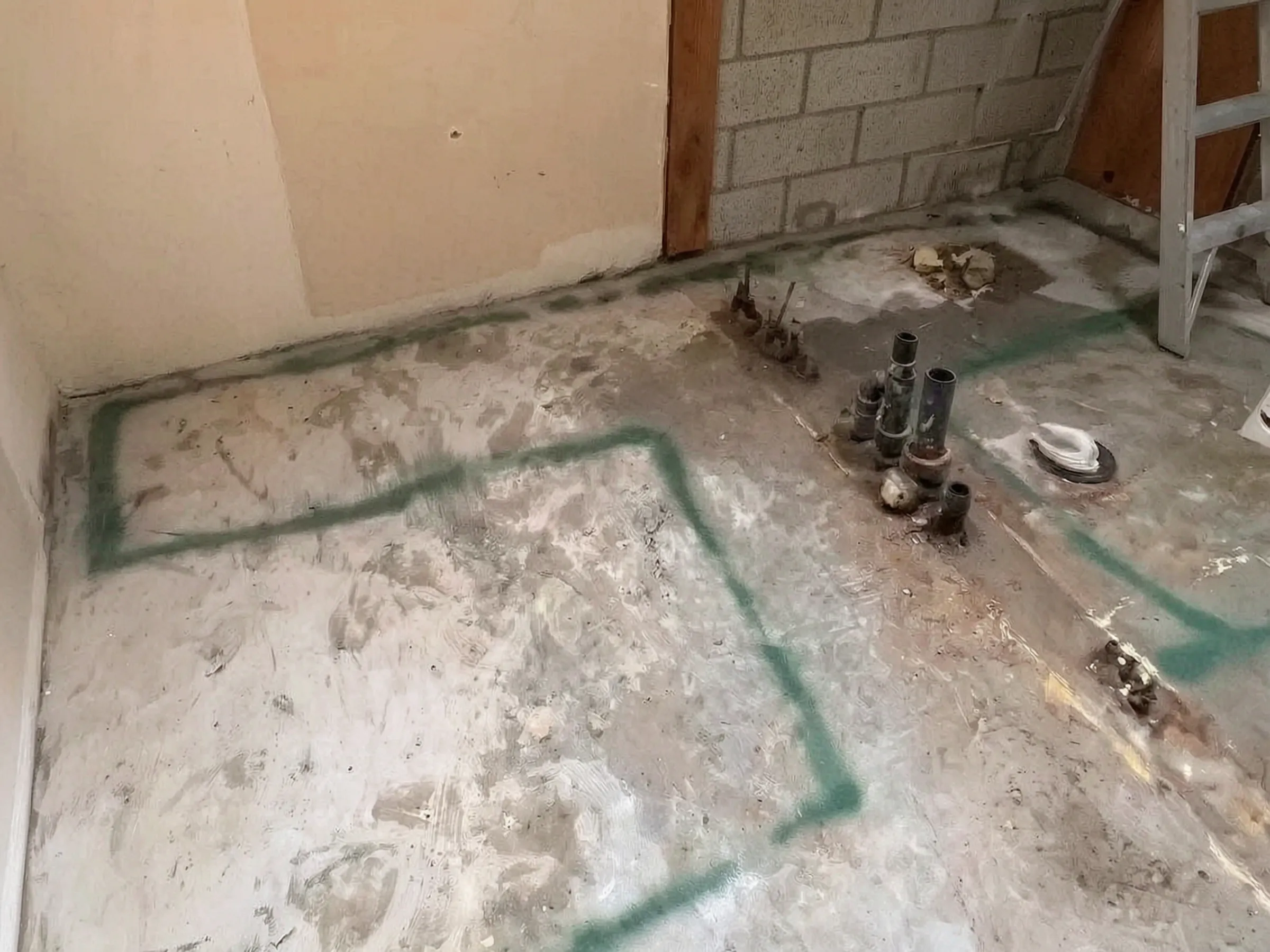 Plumbing rerouted in the slab. Whole-home remodel, Laguna Niguel, built by Avorino.