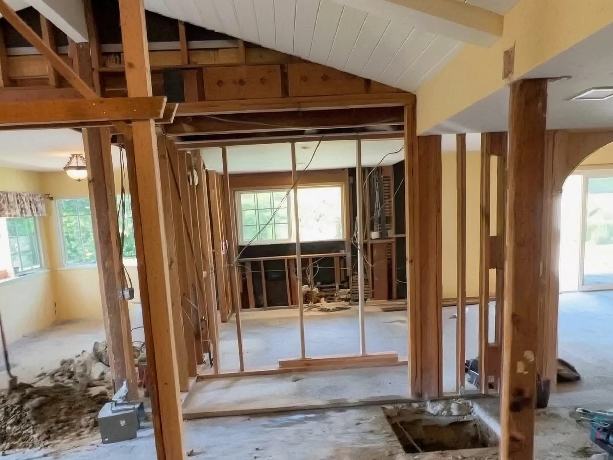 Walls opened to a new open plan. Whole-home remodel, Laguna Niguel, built by Avorino.