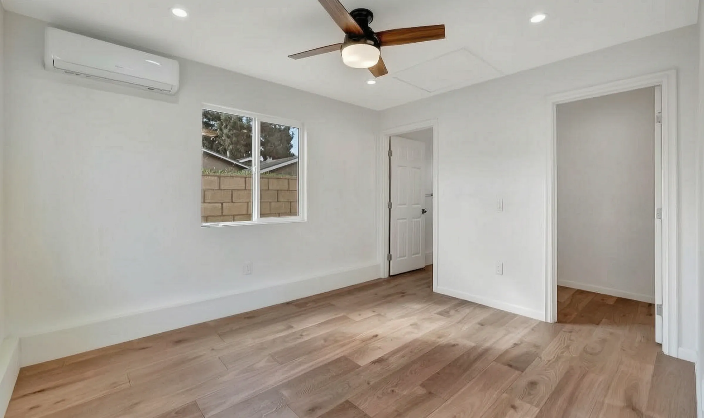 A finished bedroom in the Santa Ana new construction built by Avorino